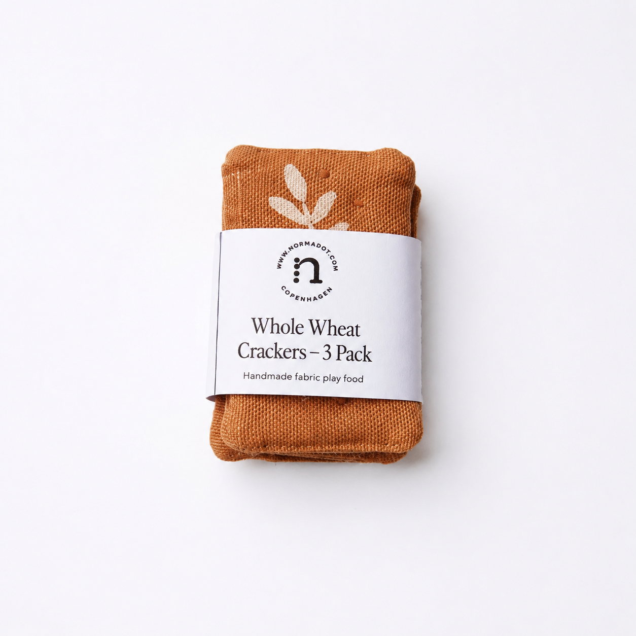 Pack of fabric play food whole wheat crackers with a label on a white background