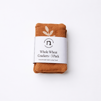 Pack of  fabric  play food whole wheat crackers with a label on a white background