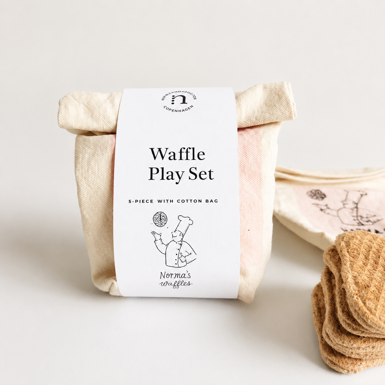 Waffle play set with packaging on a light background