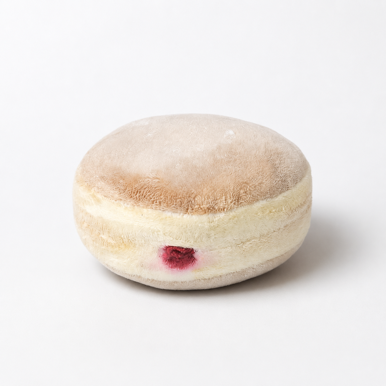 Handmade Berliner Pfannkuchen velvet play food toy with raspberry jam detail