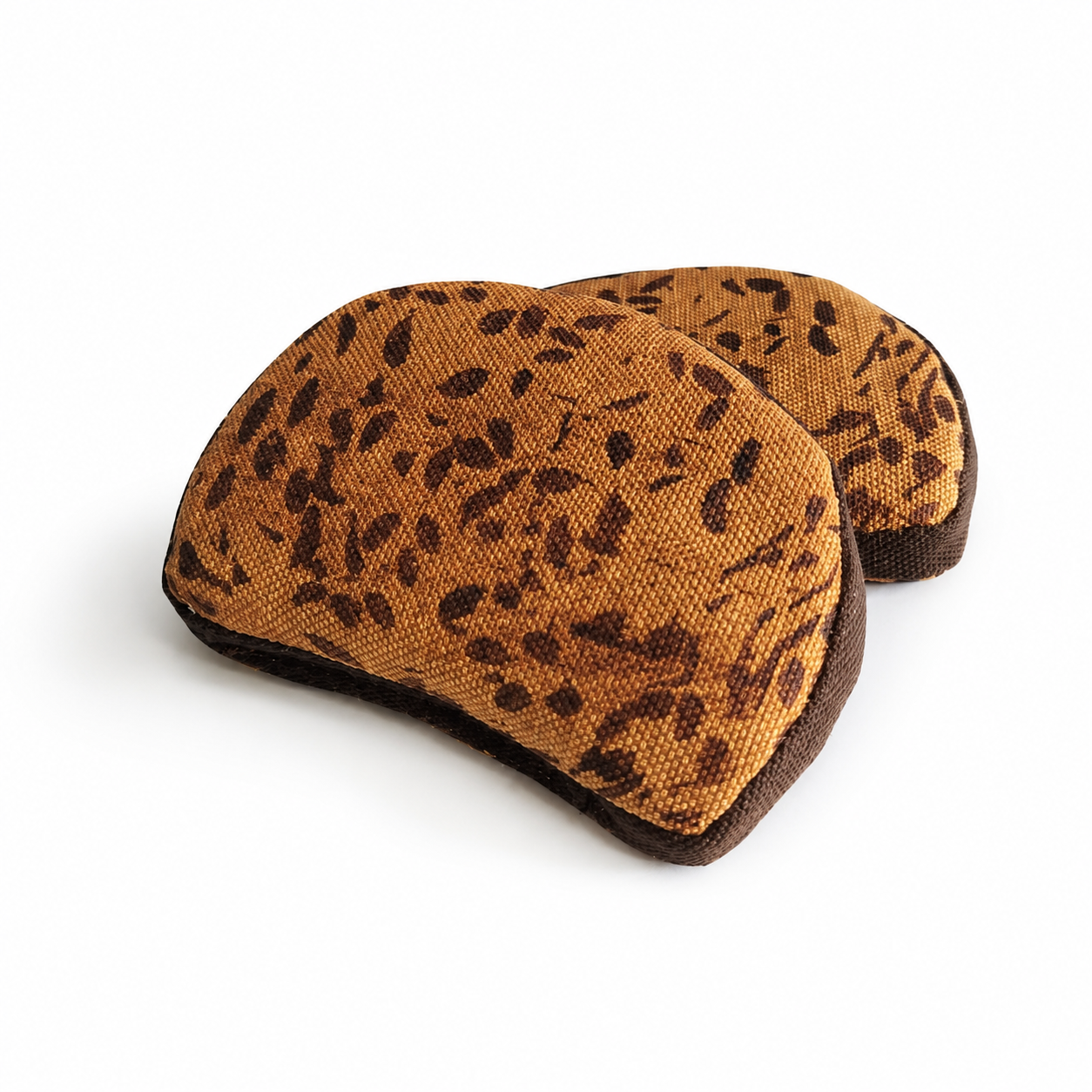 Handmade fabric Danish rye bread slices toy food with dark crust edges on a clean white studio background.