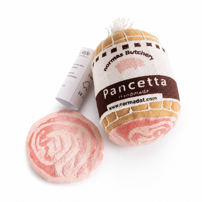 Pancetta toy with packaging on a white background