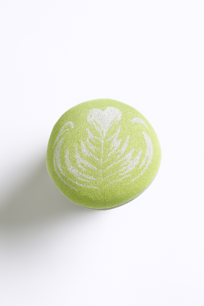 Handmade textile matcha latte play food detail with soft green cup top and white latte art, hand-printed and sewn in Denmark for pretend café play